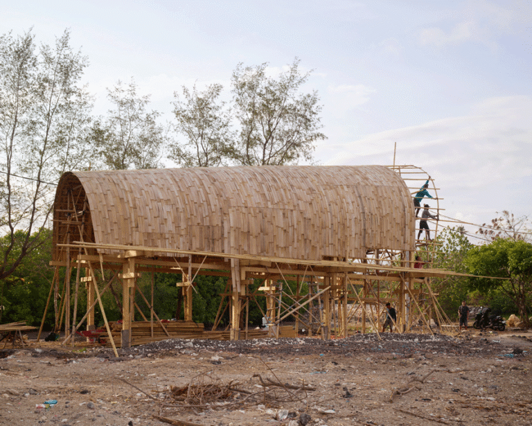 Construction of the BaleBio demonstrator in Bali showcasing nature-based building components and bamboo architecture.